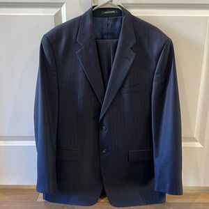Ralph Lauren 2 button Navy pinstriped suit.  44R top. 35x32 cuffed pants
